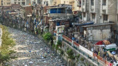 137985856 mumbai india february 26 2019 on the street in dharavi slum at mumbai top view