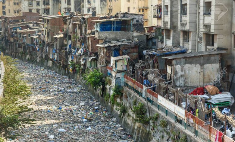 137985856 mumbai india february 26 2019 on the street in dharavi slum at mumbai top view