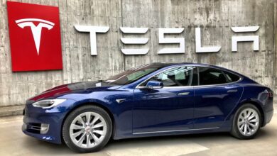 Tesla Logo and Car