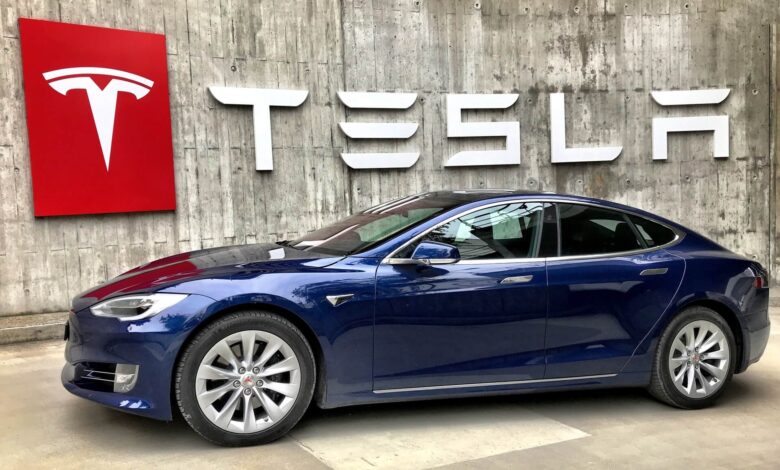 Tesla Logo and Car