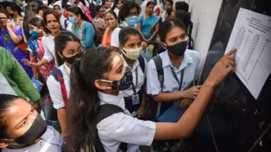patna students check the notice board for their allotted seats before appearing