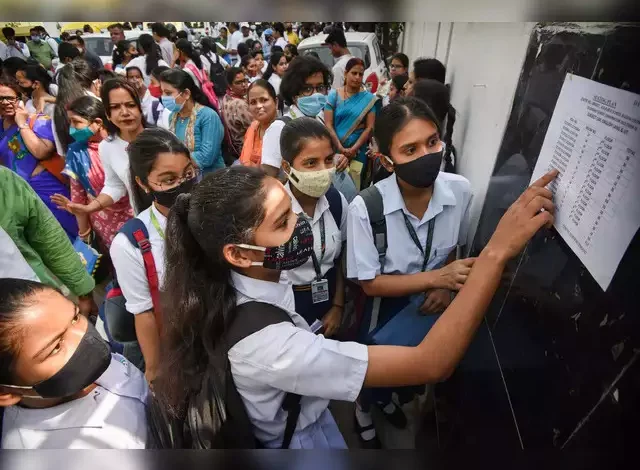 patna students check the notice board for their allotted seats before appearing